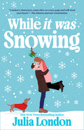 Cover Image for While It Was Snowing -- Julia London, Paperback