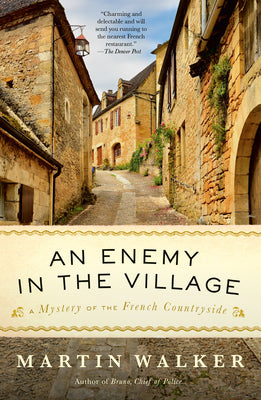 Cover Image for An Enemy in the Village: A Mystery of the French Countryside -- Martin Walker, Paperback