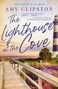 Cover Image for The Lighthouse at the Cove: A Sweet Contemporary Romance---For Fans of Charming, Small-Town Emotional Reads in 2025! -- Amy Clipston, Paperback