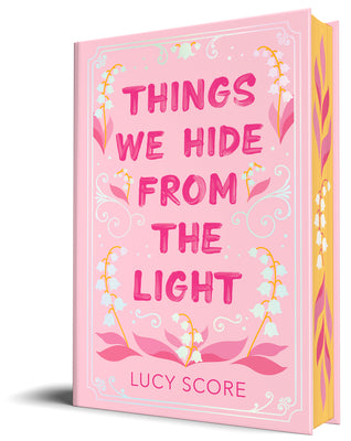 Cover Image for Things We Hide from the Light (Collector's Edition) -- Lucy Score, Hardcover
